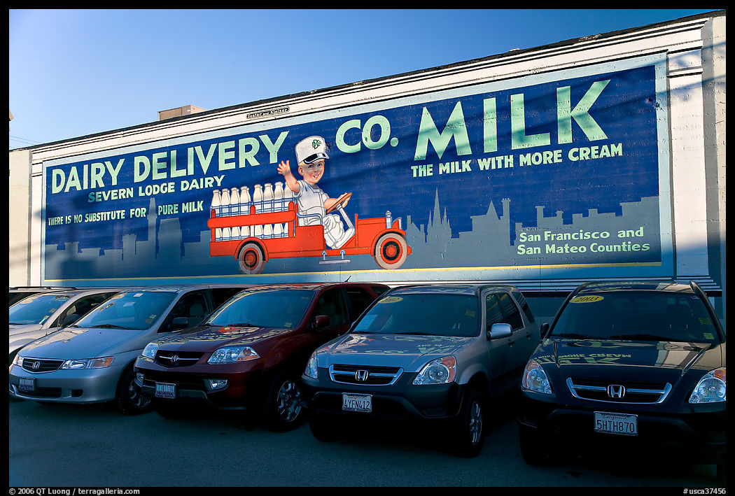 Historic advertising mural, in a car dealership lot. Burlingame, SF Bay area, California, USA
