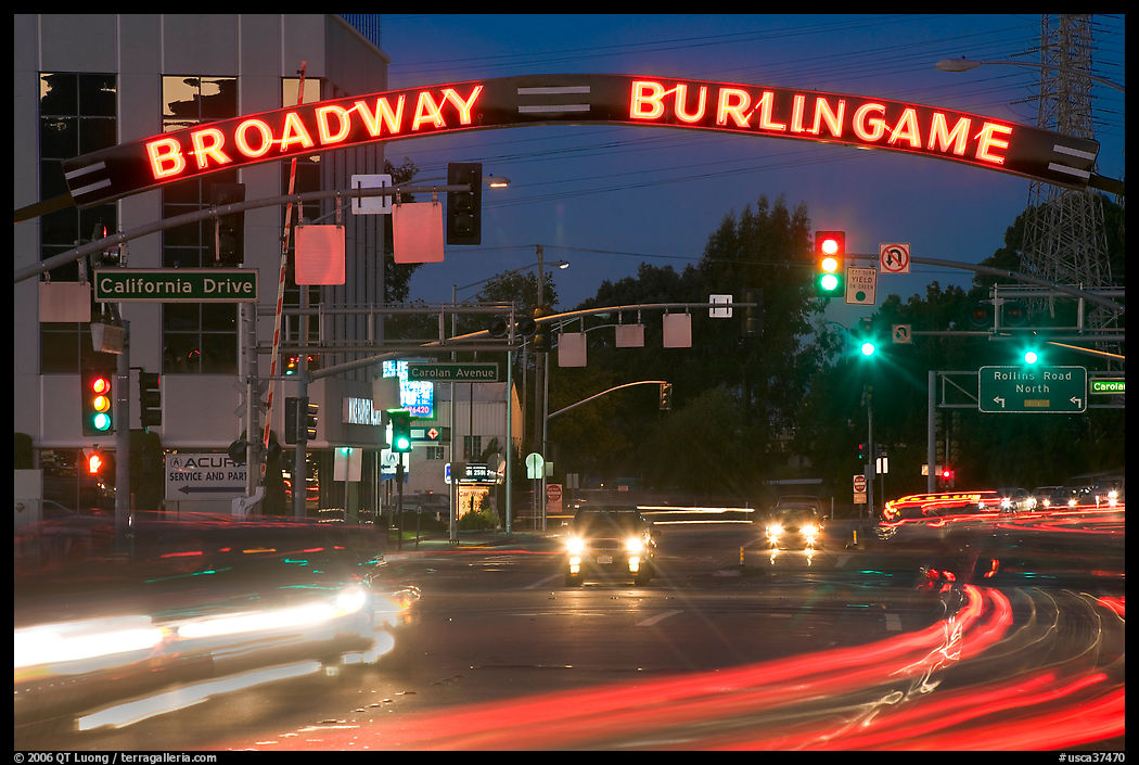 Broadway at night with lights from moving cars. Burlingame, SF Bay area, California, USA