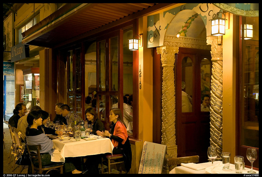 Outdoor table of Italian restaurant at night. Burlingame, SF Bay area, California, USA