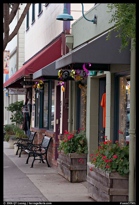 Storefront and public benches on Main Street. Half Moon Bay, California, USA
