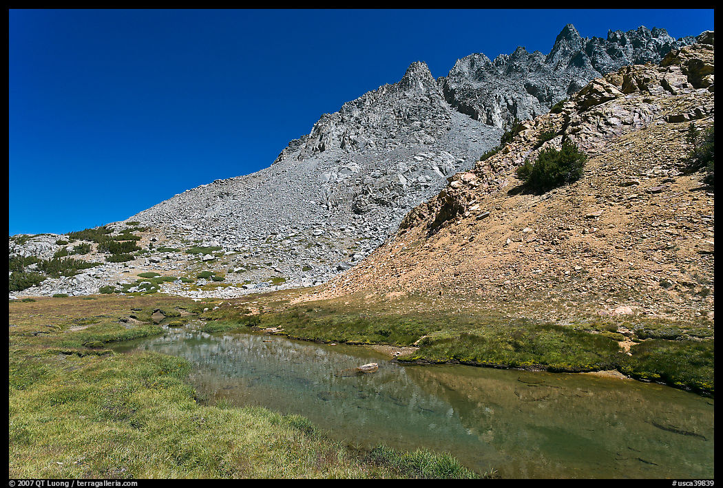 Stream and colorful rocks on Inconsolable Range. California, USA