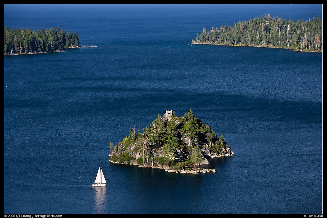 Mouth of Emerald Bay, Fannette Island, and sailboat, Lake Tahoe, California. USA