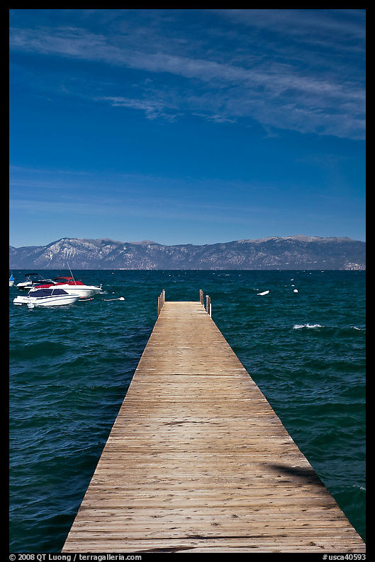 Dock, small boats, and blue waters, West shore, Lake Tahoe, California. USA