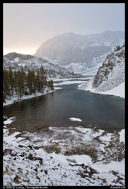Early spring snow on Ellery Lake, sunrise. California, USA