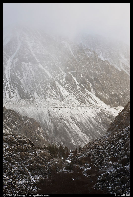 Mountains cut by Tioga Pass road with fresh snow. California, USA