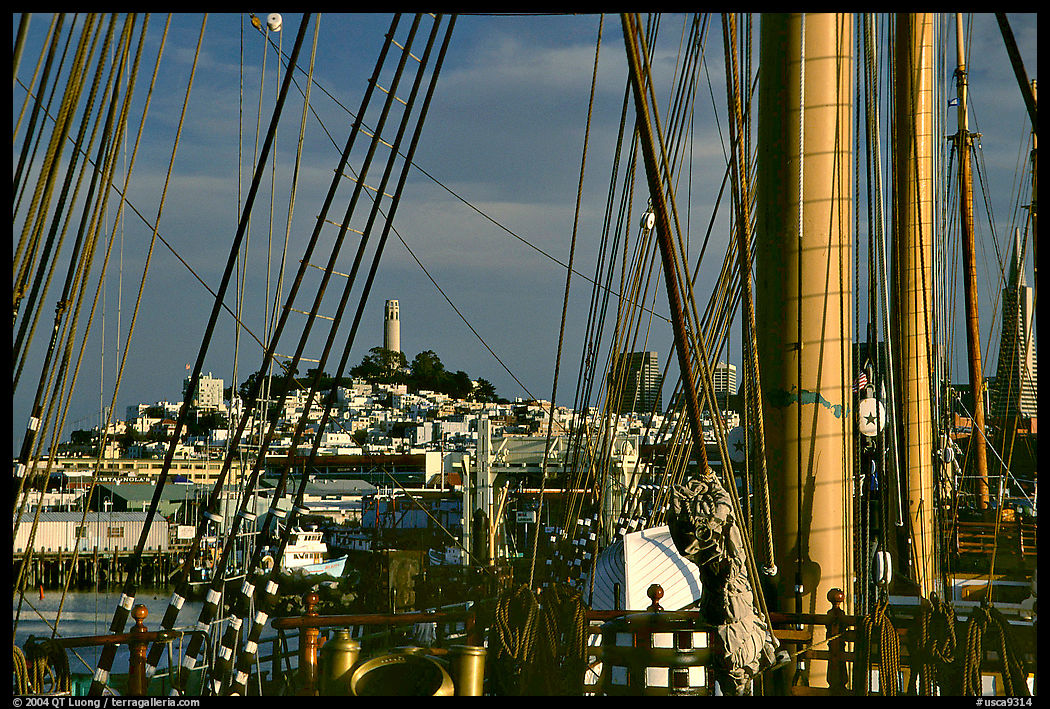Telegraph Hill and Coit Tower seen through the masts of the Balclutha. San Francisco, California, USA