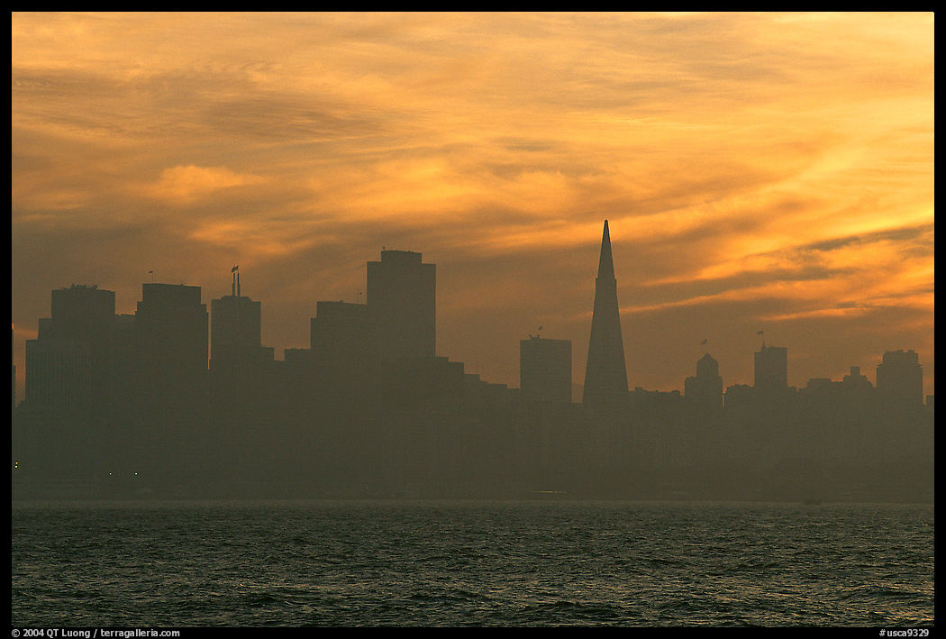 City skyline with sunset clouds seen from Treasure Island. San Francisco, California, USA
