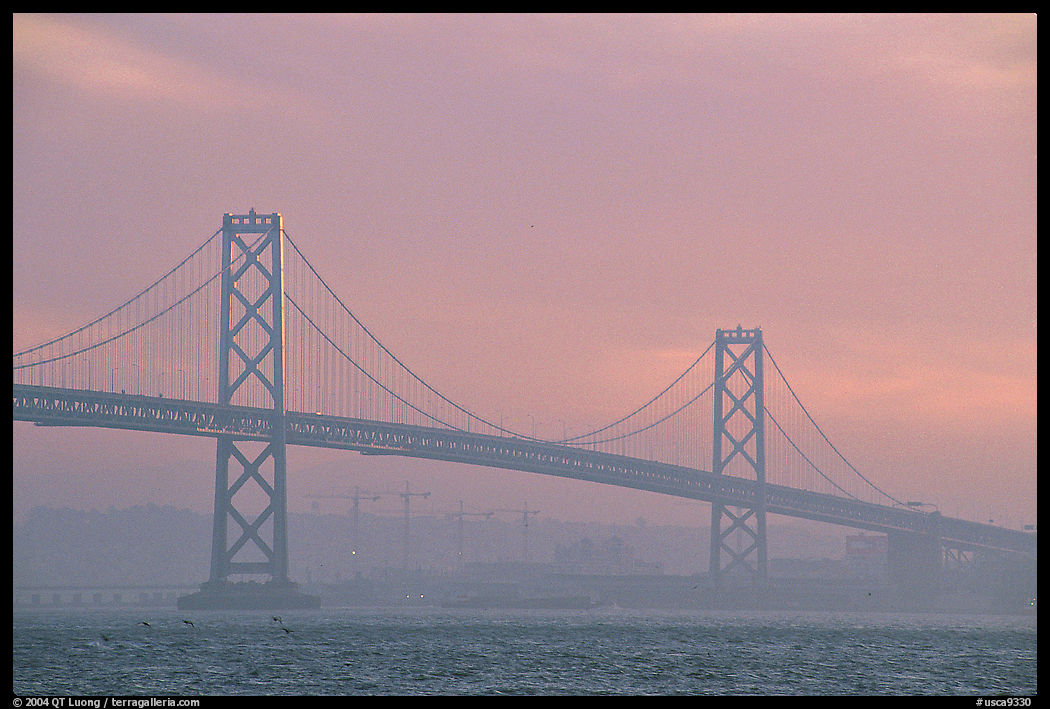 Bay Bridge seen from Treasure Island, sunset. San Francisco, California, USA