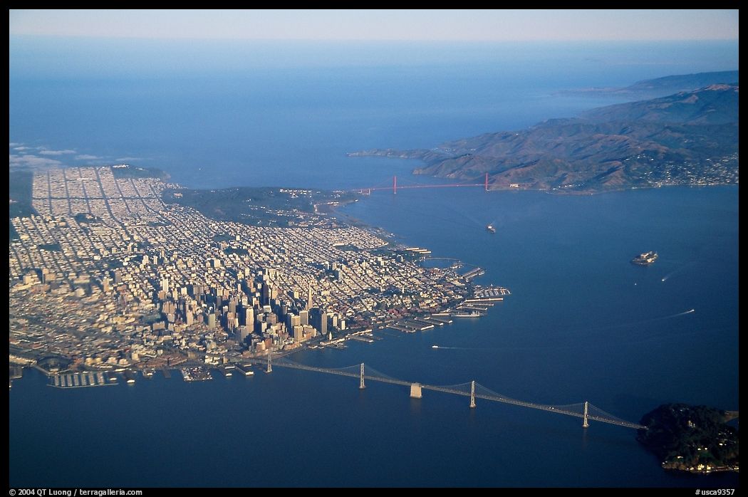 Aerial view of the Bay Bridge, the city, and  the Golden Gate Bridge. San Francisco, California, USA