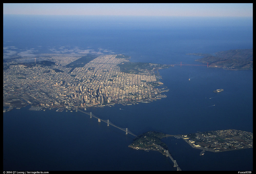 Aerial view of the Bay Bridge, the city, and  the Golden Gate Bridge. San Francisco, California, USA