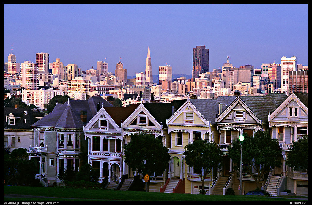 Victorians at Alamo Square and skyline, dusk. San Francisco, California, USA