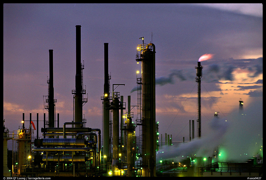 Pipes of Oil Refinery near Rodeo at dusk. SF Bay area, California, USA