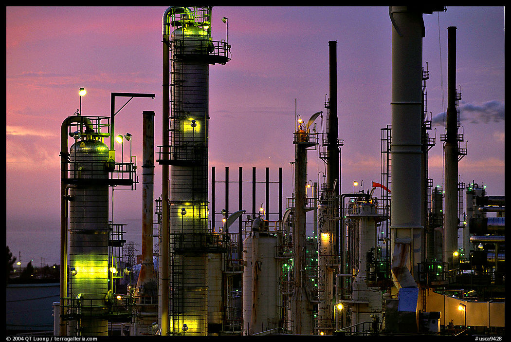 Pipes of industrial Oil Refinery near Rodeo at dusk. SF Bay area, California, USA