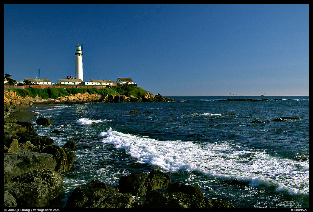 Wave and Pigeon Point Lighthouse, afternoon. San Mateo County, California, USA