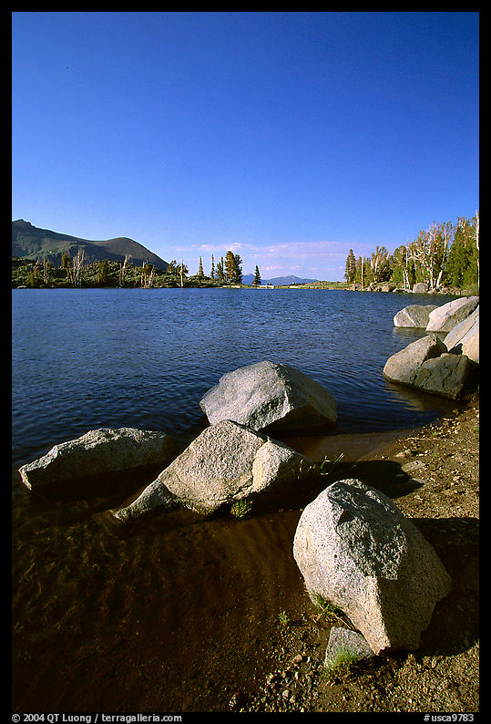 Boulders at the edge of Frog Lake, afternoon. Mokelumne Wilderness, Eldorado National Forest, California, USA