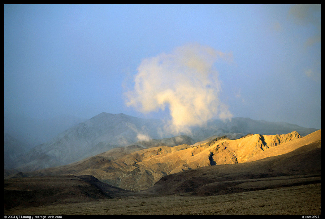Cloud and Inyo Mountains  in stormy weather, late afternoon. California, USA