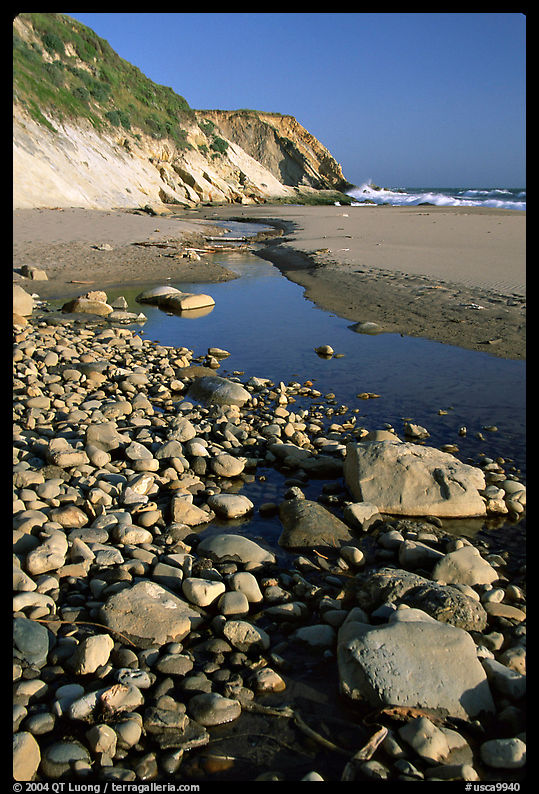 Pebbles, pool, and beach near Fort Bragg. California, USA