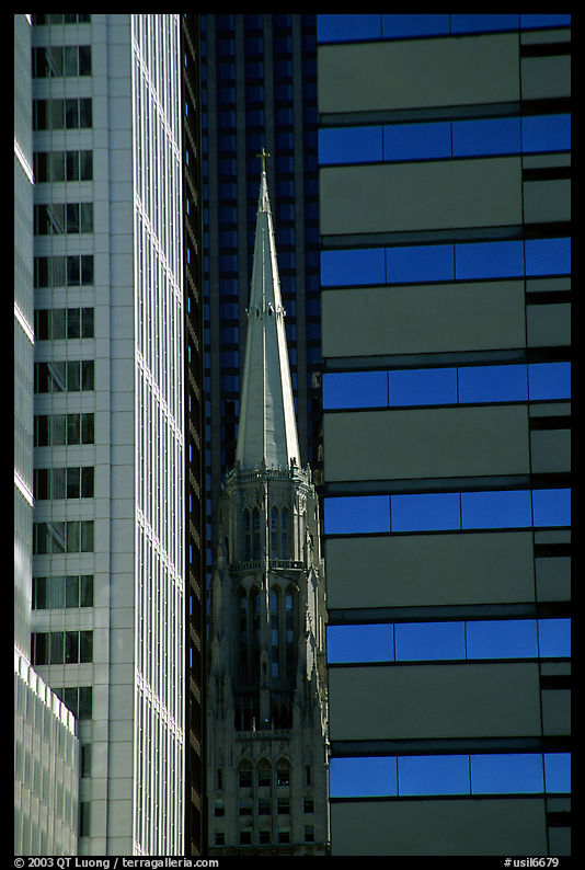 Church spire and modern buildings. Chicago, Illinois, USA
