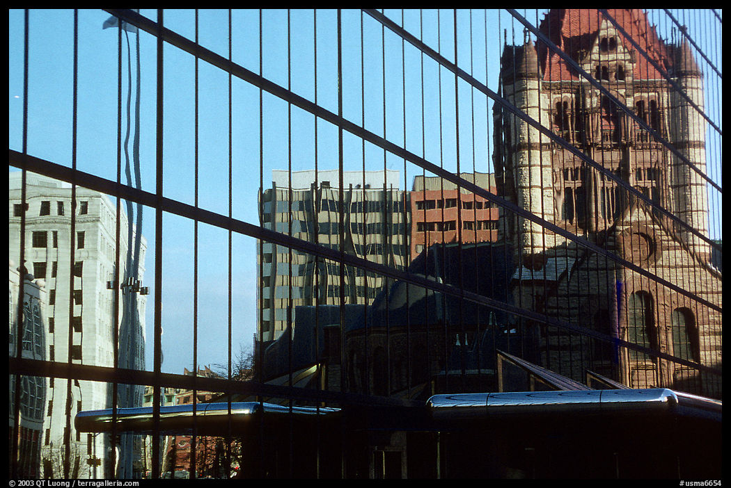 Historic church reflected in a modern glass building. Boston, Massachussetts, USA