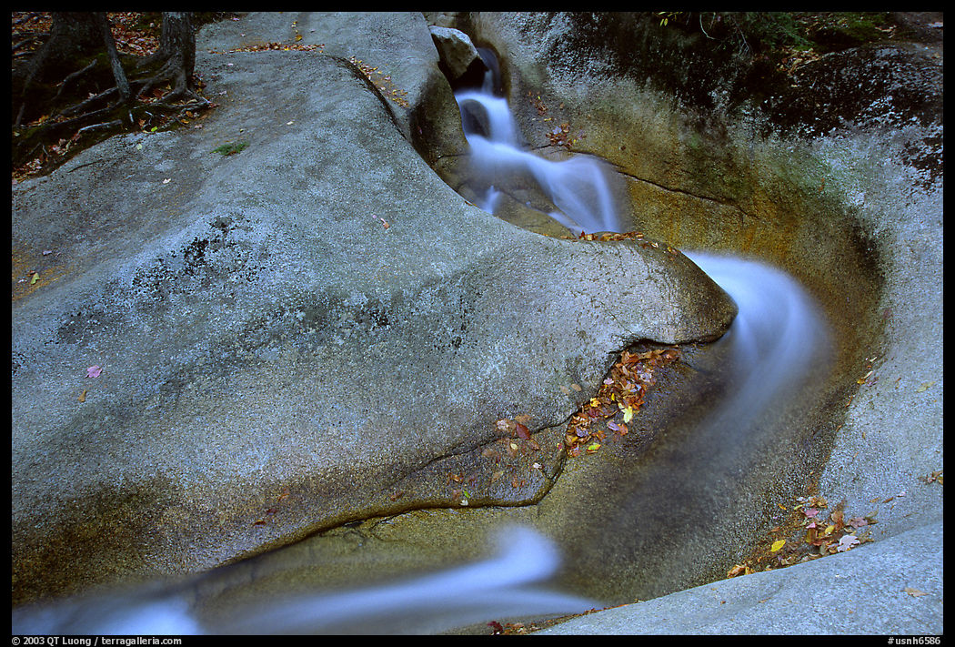 Water cascade over smooth rock, Franconia Notch. New Hampshire, New England, USA