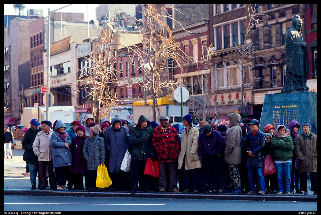 Gathering in Chinatown in winter. New York City, USA
