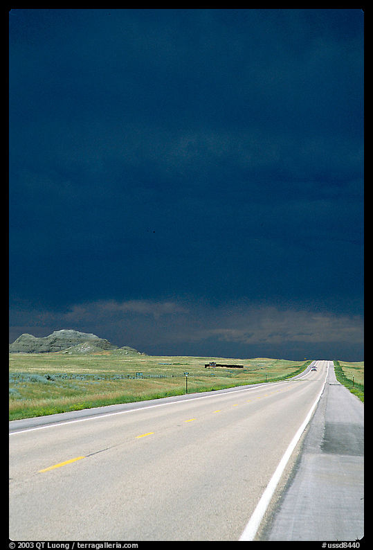 Storm cloud over road. South Dakota, USA