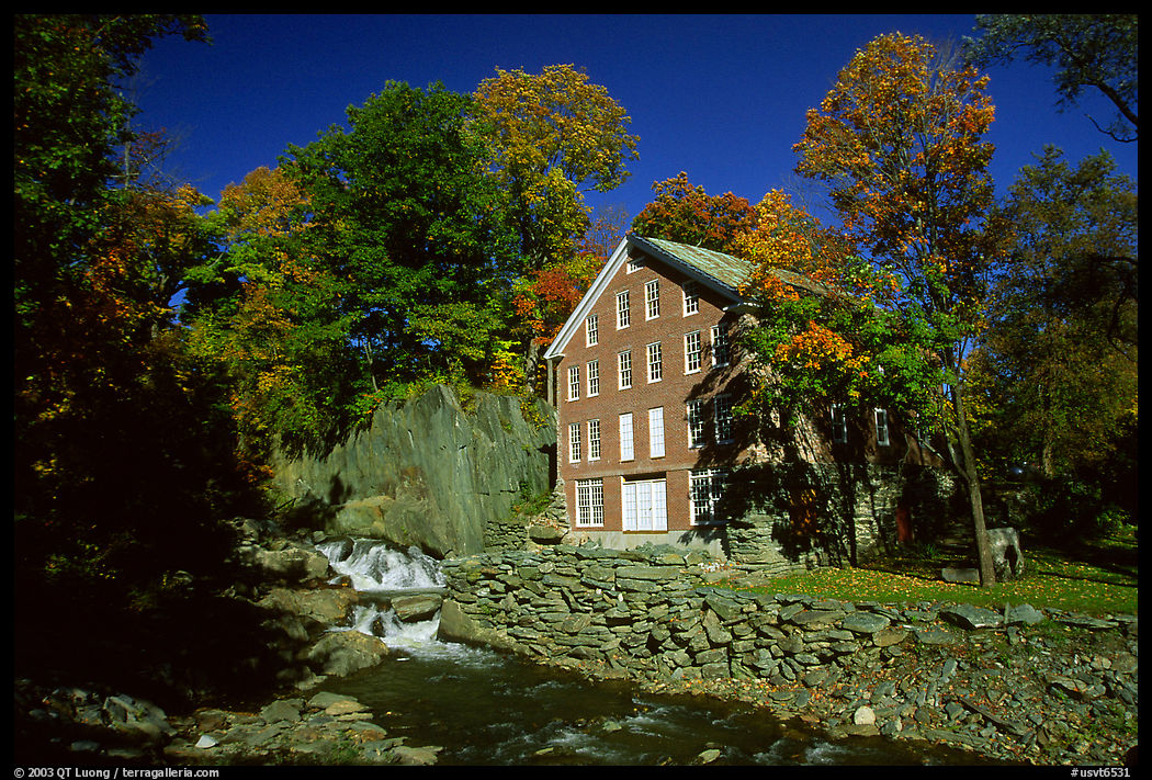 Old Mill next to a cascading brook near Stowe. Vermont, New England, USA