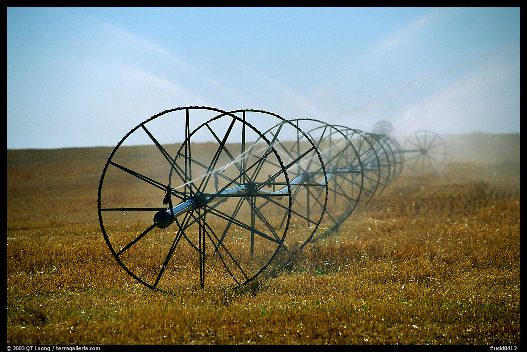 Irrigation wheels spraying water. Idaho, USA