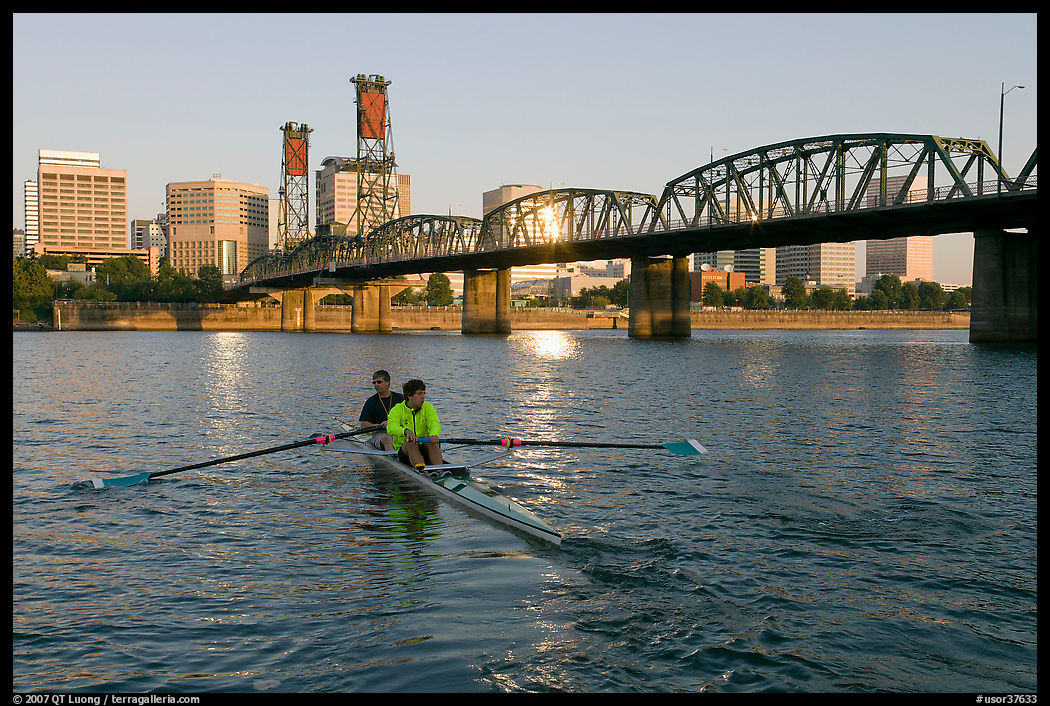 Men on double-oar shell rowing on Williamette River. Portland, Oregon, USA