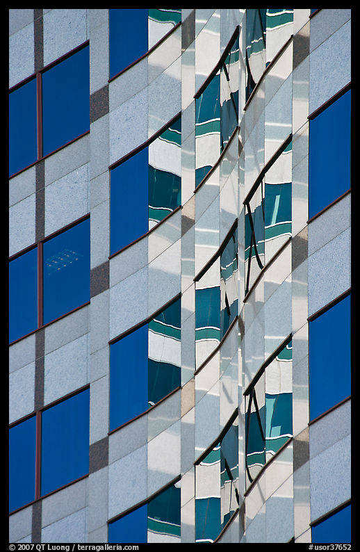 Pattern of windows and reflections in high rise building. Portland, Oregon, USA
