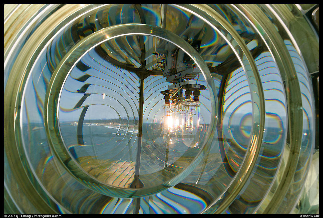 Light and Fresnel lens inside Cape Bianco Lighthouse. Oregon, USA