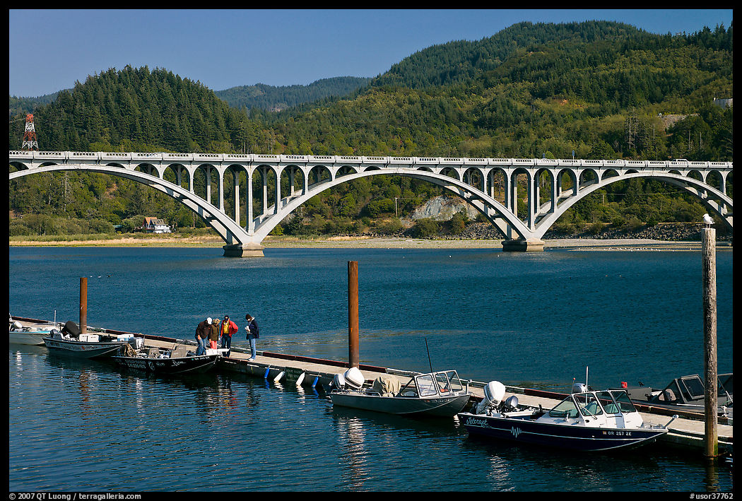 Small boat deck and Rogue River bridge. Oregon, USA