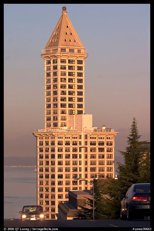 Smith Tower and cars on steep street, early morning. Seattle, Washington