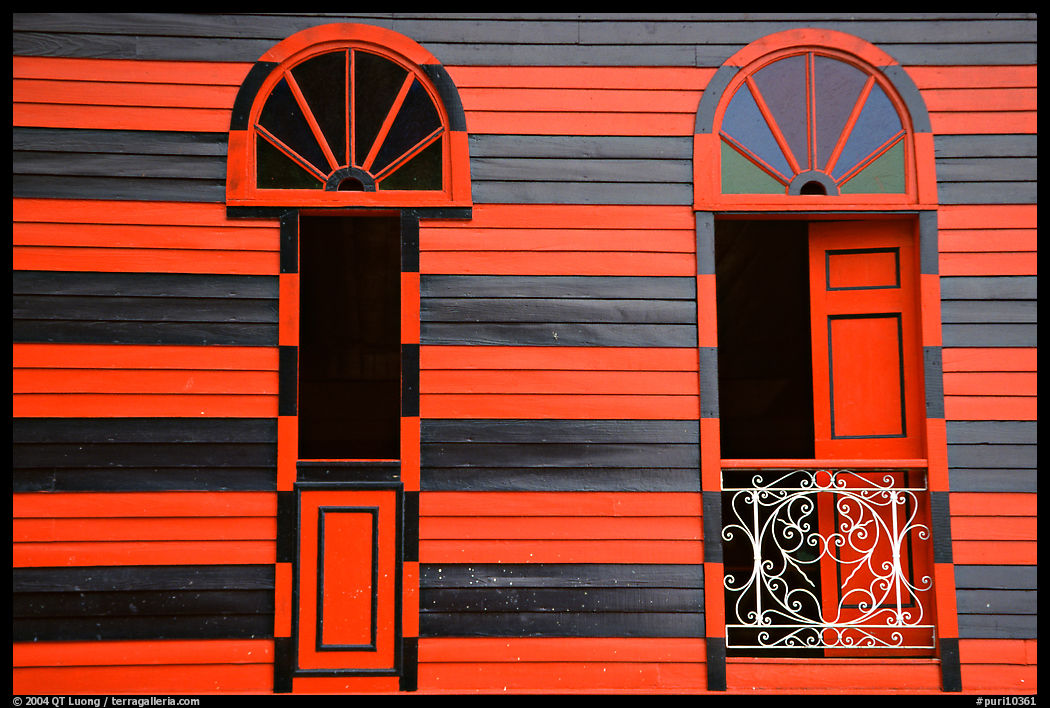 Red window shutters and striped walls, Parc De Bombas, Ponce. Puerto Rico