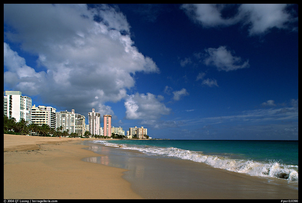 Beach and modern residential towers, morning. San Juan, Puerto Rico