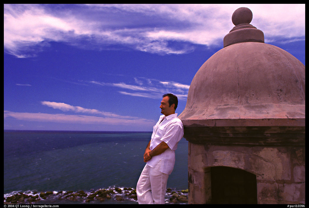 Man leaning against a lookout turret, Fort San Felipe del Morro. San Juan, Puerto Rico