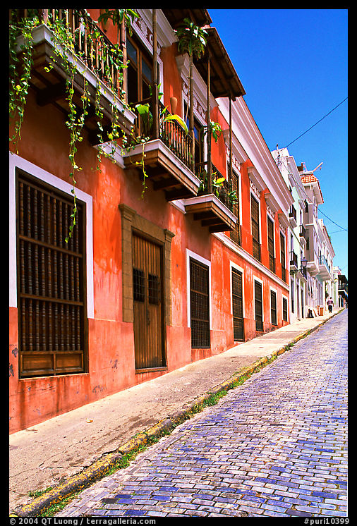 Old cobblestone street and pastel-colored houses, old town. San Juan, Puerto Rico