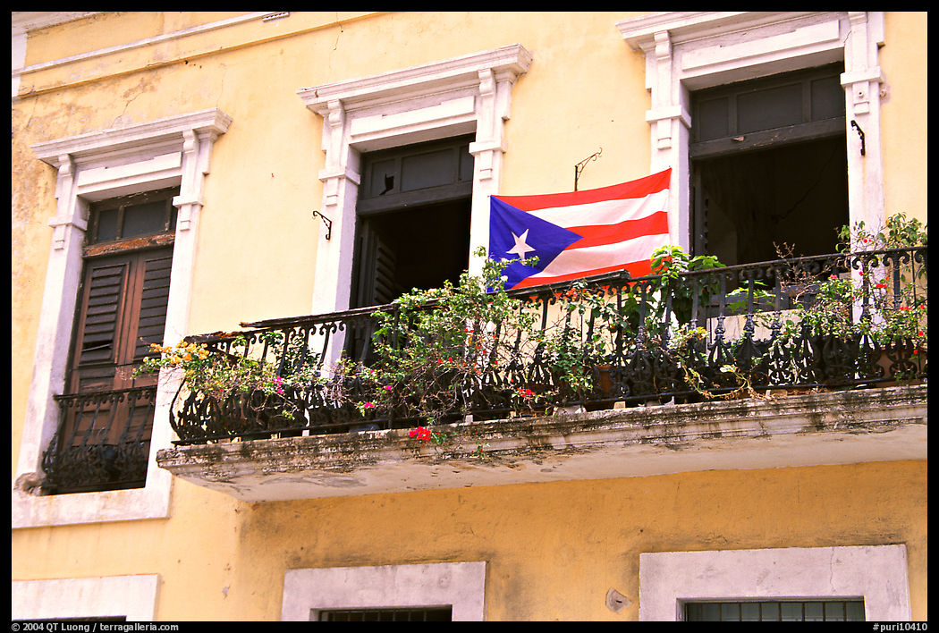 Balcony and flag of Puerto Rico. San Juan, Puerto Rico