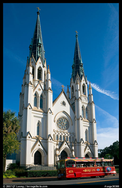 Church and red trolley. Savannah, Georgia, USA