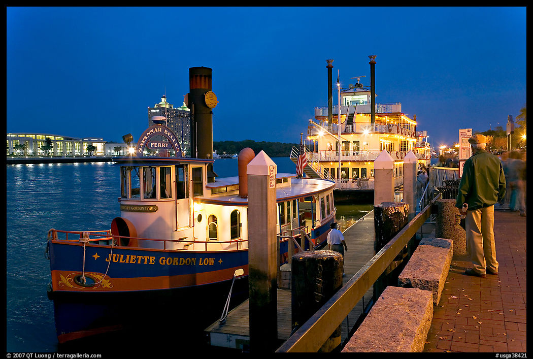 Ferry and riverboat on Savannah River at dusk. Savannah, Georgia, USA