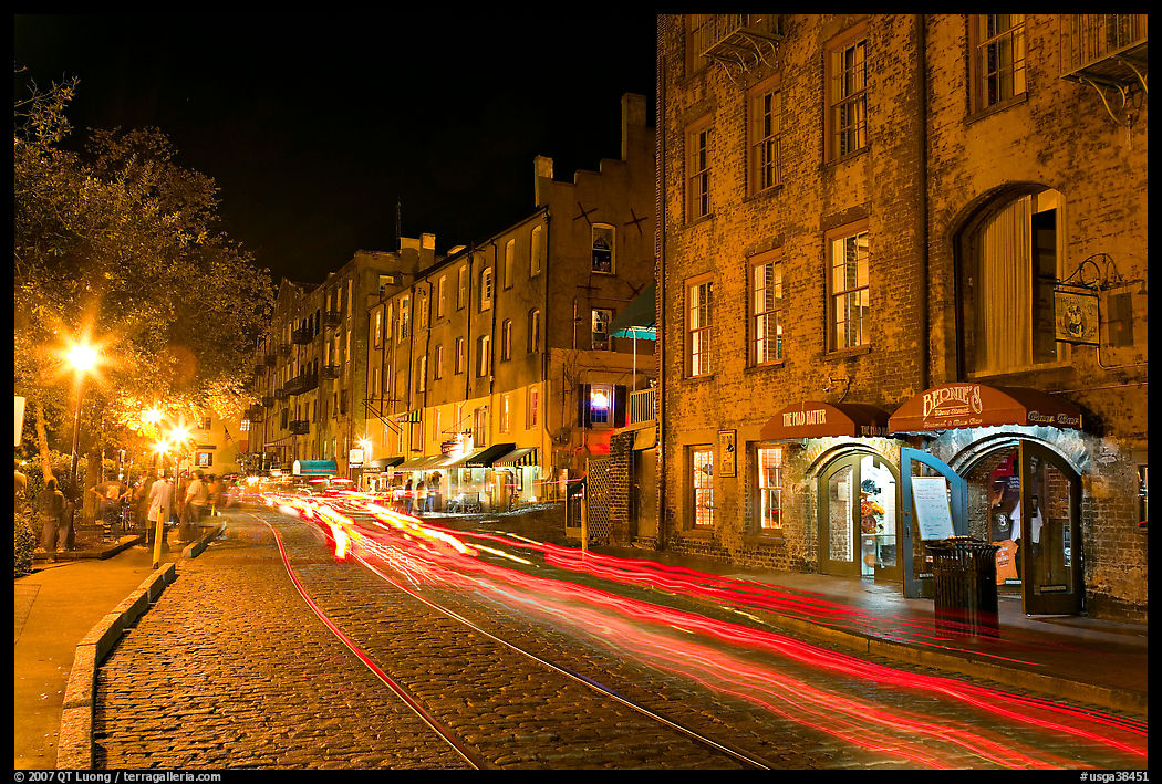 Car lights on River Street by night. Savannah, Georgia, USA