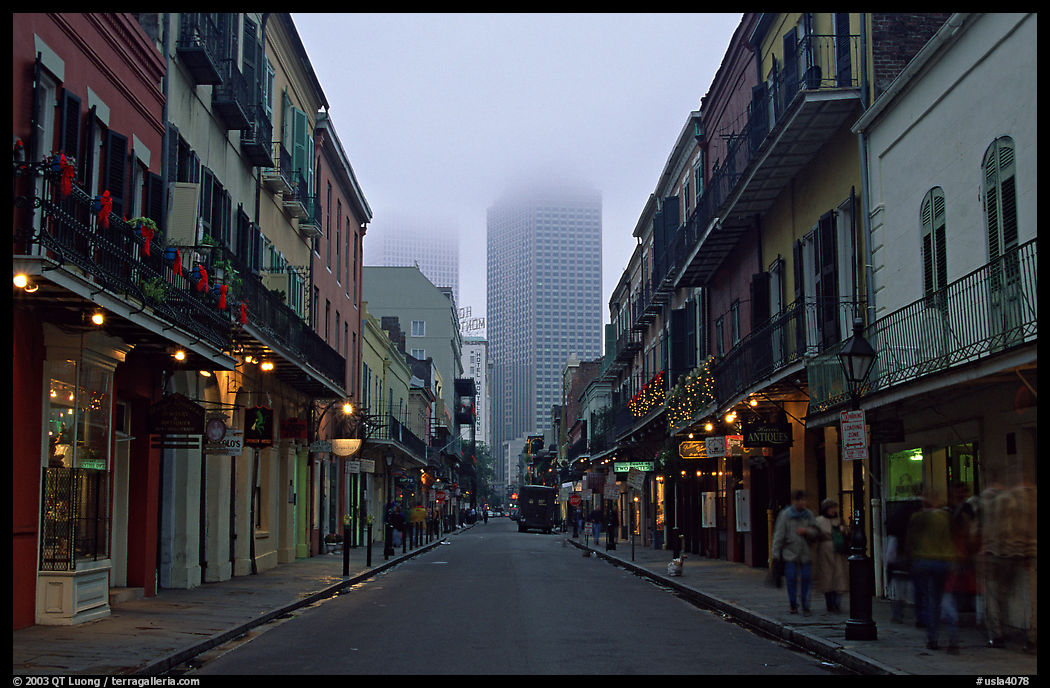 Bourbon street and the new town in the fog, French Quarter. New Orleans, Louisiana, USA