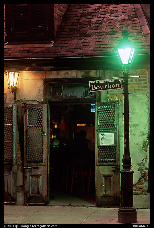 Cafe on Bourbon street at night, French Quarter. New Orleans, Louisiana, USA