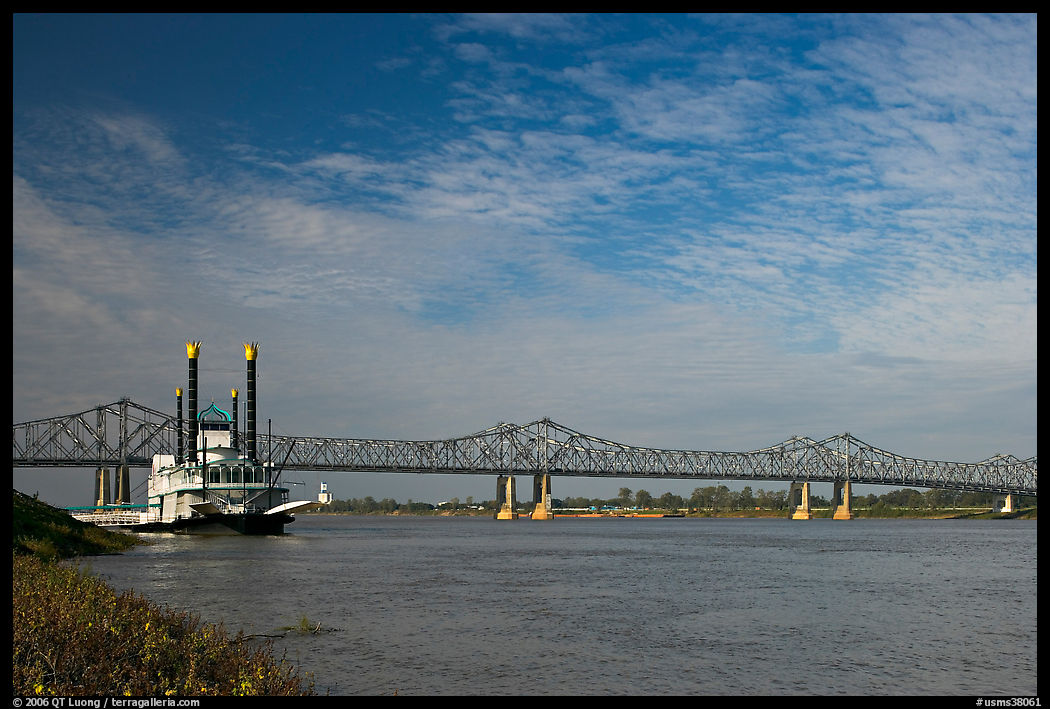Mississippi River, paddle steamer, and bridge. Natchez, Mississippi, USA