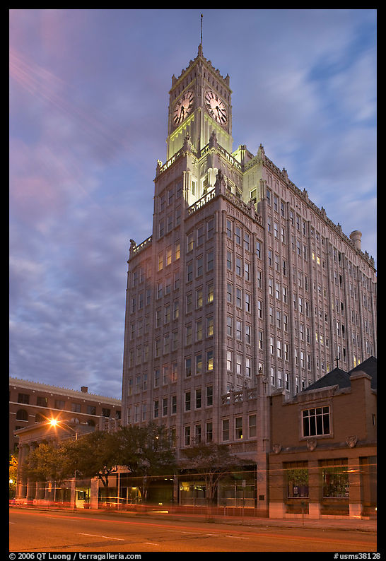 Art Deco building with clock tower at dusk. Jackson, Mississippi, USA
