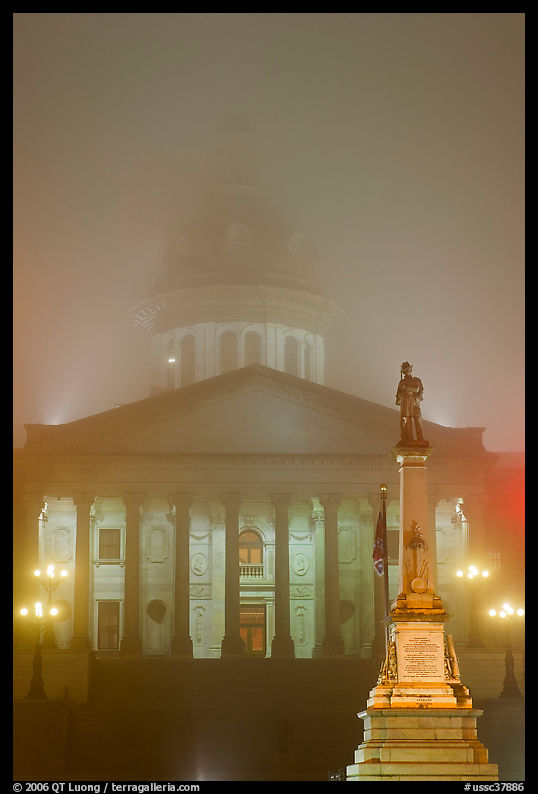 Monument and state capitol in fog at night. Columbia, South Carolina, USA