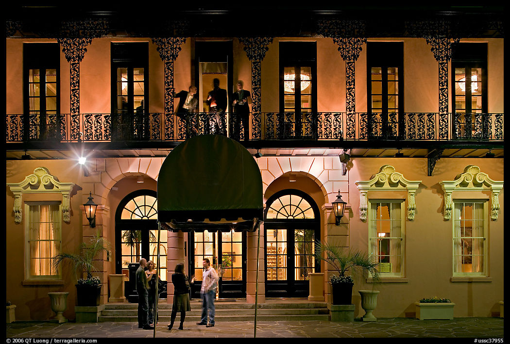 Mills house hotel facade with balconies at night. Charleston, South Carolina, USA