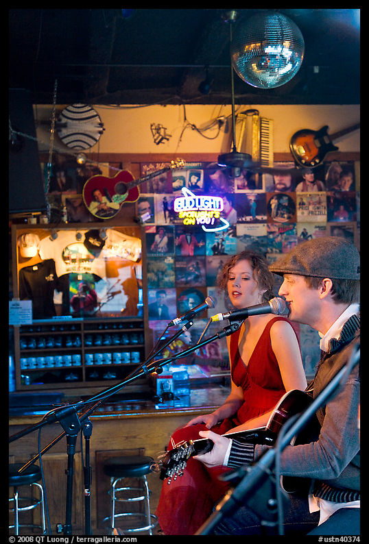 Man and woman singing country music at Tootsie Orchid Lounge. Nashville, Tennessee, USA