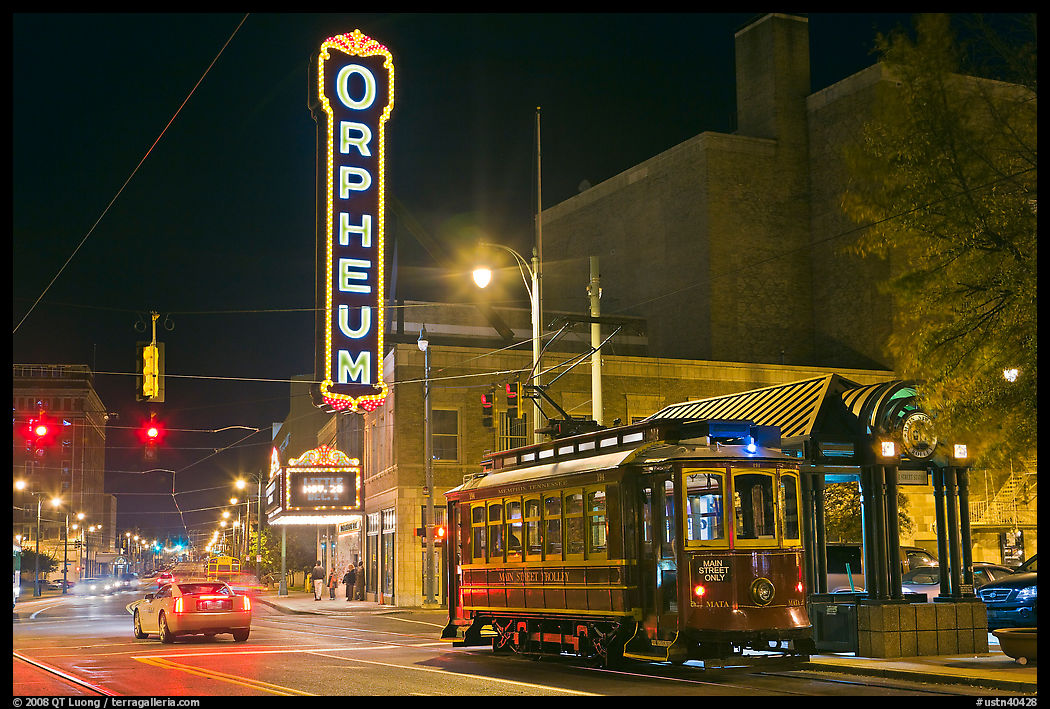 Street by night with trolley and Orpheum theater. Memphis, Tennessee, USA