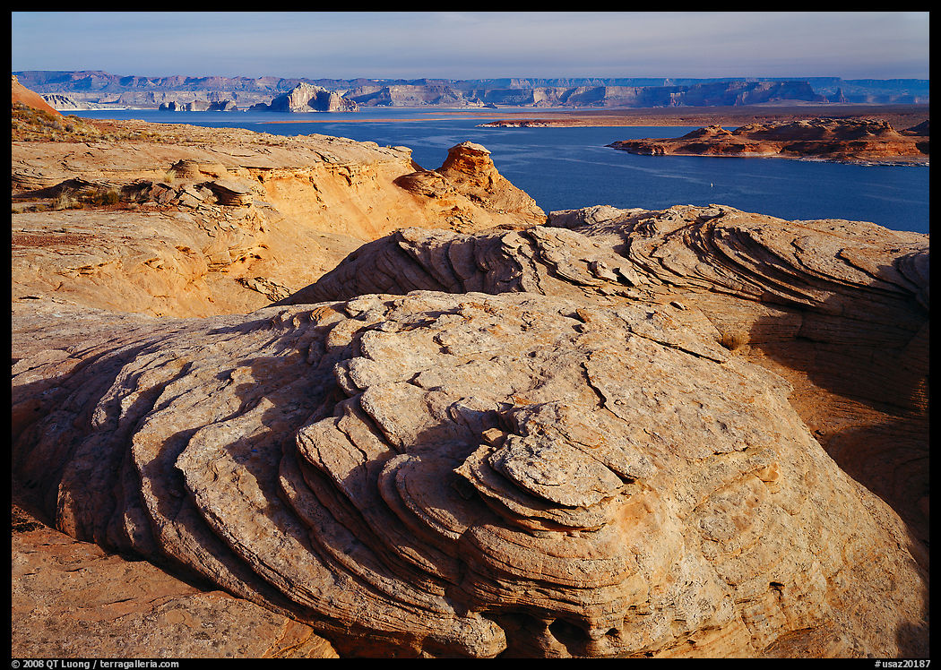 Sandstone Swirls and Lake Powell, Glenn Canyon National Recreation Area, morning. Arizona, USA